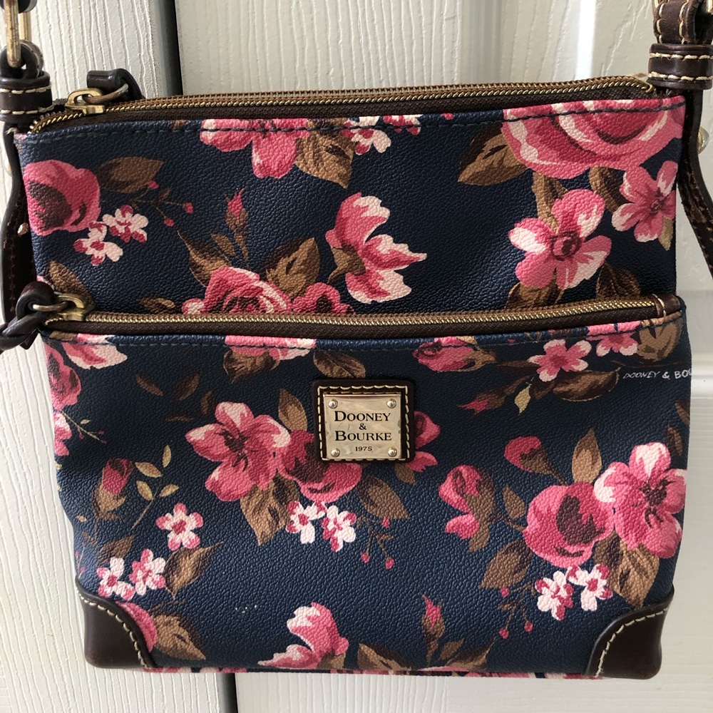 Dooney & Bourke navy floral crossbody with red interior